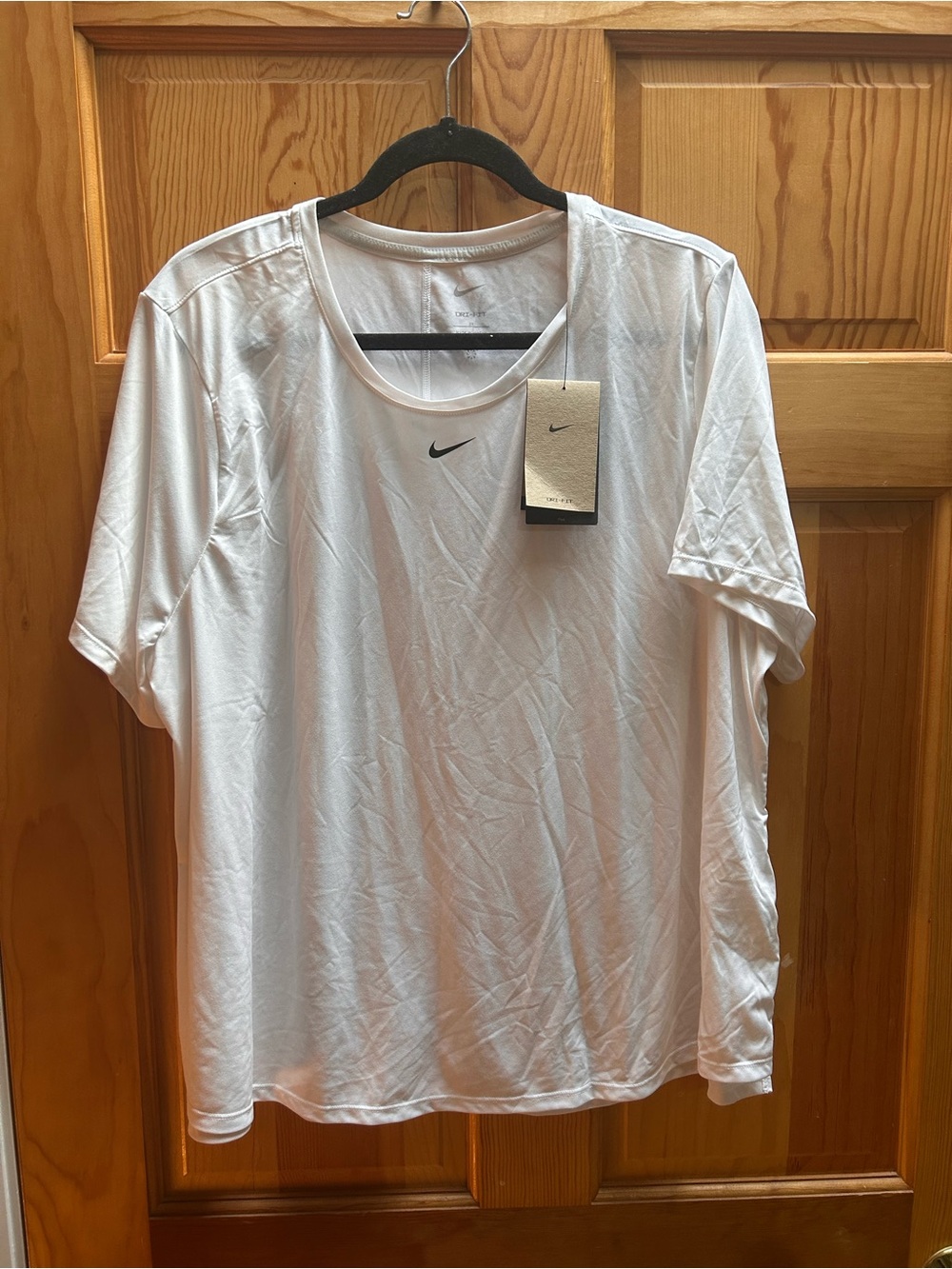 Nike Men’s White Short Sleeve Dri-FIT Tee with Black Swoosh